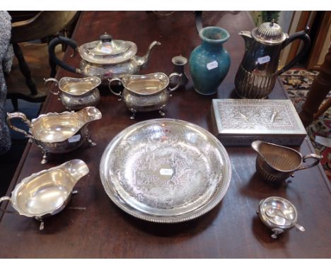 A TEA SERVICE AND AN ASIAN WHITE METAL CIGARETTE BOX with other plated domestic wares and two stoneware vases