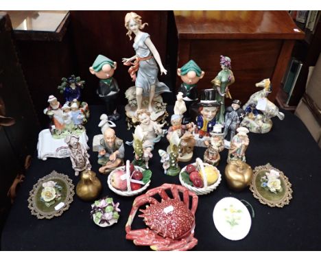 A COLLECTION OF FIGURINES ceramic and other, including fruit and flowers and some Capodimonte figures