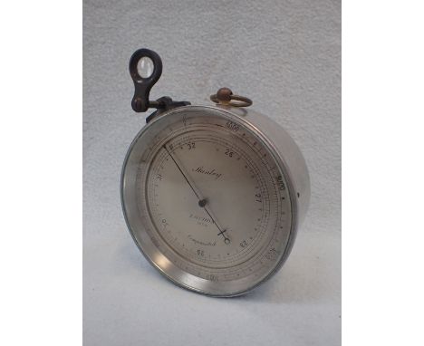 A METAL-CASED ANEROID BAROMETER,  BY STANLEY, LONDON 
