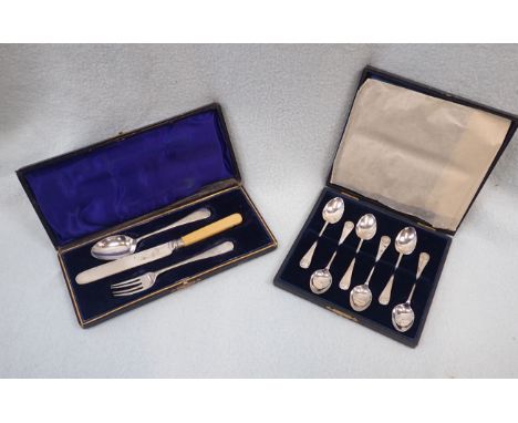 A CASED SET OF SILVER TEA SPOONS with a cased knife, fork and spoon