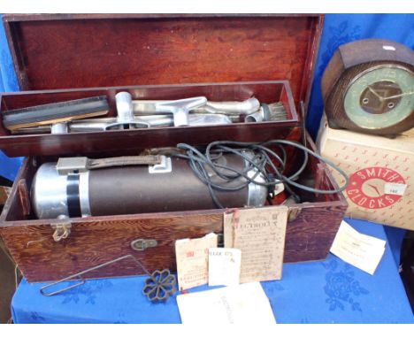 A 1930S ELECTROLUX VACUUM CLEANER cased, with instructions (sold as a decorative collectible only), a 1950s Smith's mantel cl