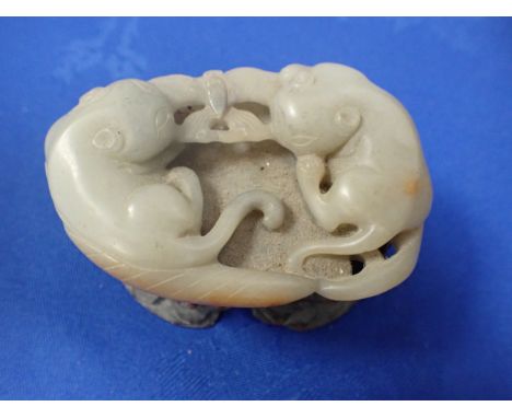 A CHINESE JADE CARVING OF CAT GROUP on a carved wooden stand