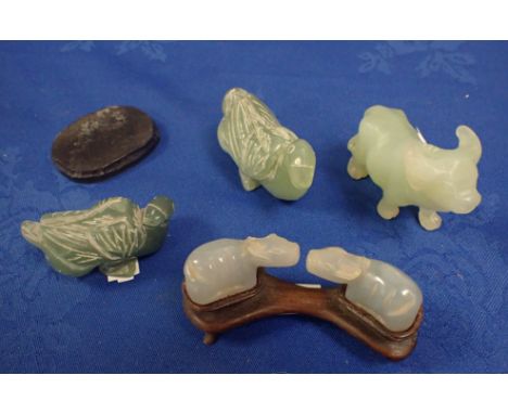 A GROUP OF CARVED JADE OXEN together with two carved jade ducks