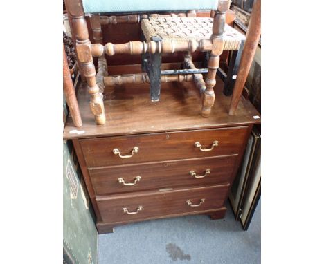 AN EDWARDIAN MAHOGANY CHEST OF THREE DRAWERS on bracket feet, of small proportions 77cm wide