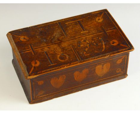 A 19th century folk art box, the hinged cover inlaid with the initials and year 'C.T 1829', over a front panel inlaid with th