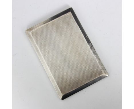 A George V silver cigarette case, Thomas William Lack, London 1936, of rectangular form with engine turned decoration to exte