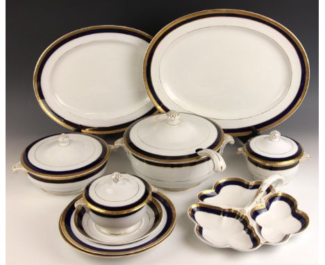 A Mintons part dinner service, comprising: an hors d'oeuvres dish, ten side plates, a soup tureen and ladle, twelve soup plat