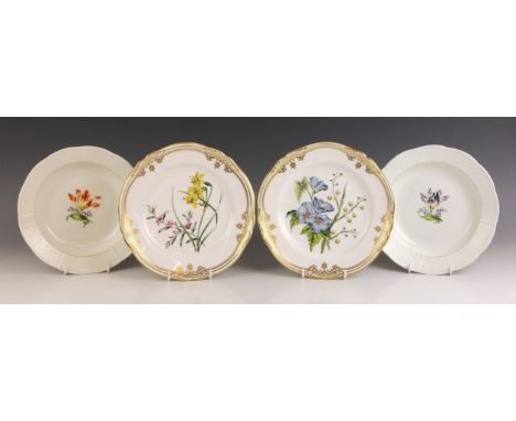 Two Meissen desert bowls, second quality, each with ozier border, the wells externally decorated with floral sprays, undergla