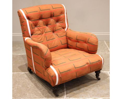 A Victorian walnut armchair, by Charles Hindley & Sons, London, later re-covered in geometric pattern fabric, the chair of de