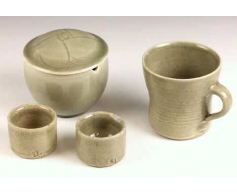 A St. Ives Leach Pottery mug, mid 20th century, of flared and waisted form, impressed Leach Pottery seal mark below handle, 7