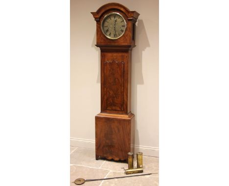 A George IV mahogany cased eight day chiming longcase clock, signed T. Yates, Preston, the arched hood with side fretwork pan