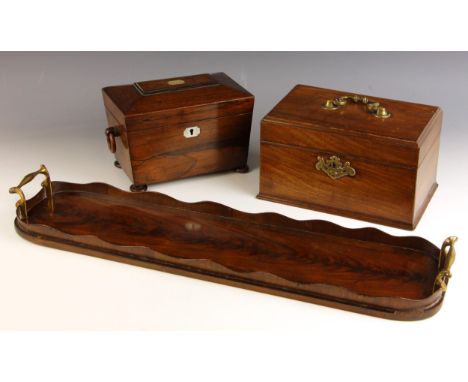 A William IV rosewood tea caddy, of sarcophagus form, the hinged cover inlaid with a mother of pearl cartouche opening two a 