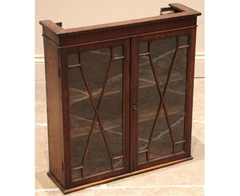 A George III mahogany glazed wall cabinet, the pair of astragal glazed doors opening to a pair of shelves, 67cm H x 62cm W x 