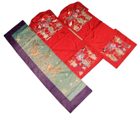 A Chinese silk embroidered panel, early 20th century, the rectangular panel stitched with golden threads against a green grou