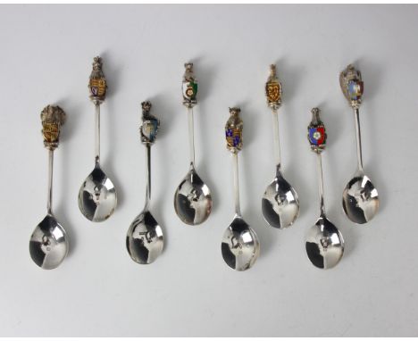 A set of eight silver and enamel ‘The Queen’s Beasts’ spoons, Toye Kenning and Spencer, Birmingham 1977, the cast finials dep