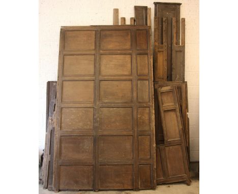 A collection of 18th century and later oak panelling, the largest panel 239cm x 138cm, applied with moulded muntins, further 