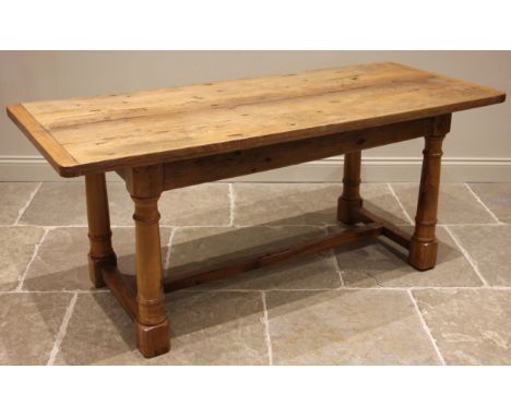 A 17th century style light oak refectory table, 19th century and later, the cleated plank top upon later turned supports and 