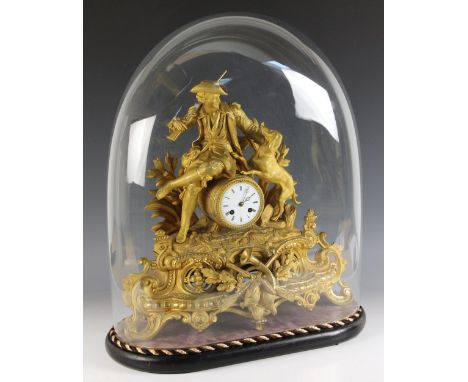 A late 19th/early 20th century French gilt metal mantel clock, the 10cm white enamelled drum dial surmounted with the figure 