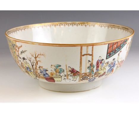 A Chinese porcelain famille rose centre bowl, Qianlong (1736-1795), the large circular bowl externally decorated with two res