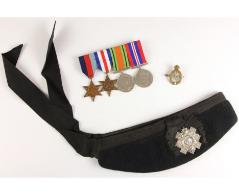A World War II four, comprising: the War Medal 1939-1945, The Defence Medal, The 1939-1945 Star, and The France And Germany S