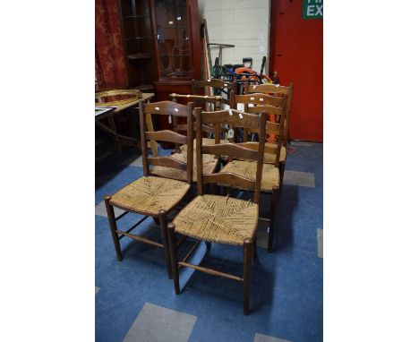 A Set of Four Oak Framed Rush Seated Ladder Back Chairs Together with 19th Century Ladder Back Examples 