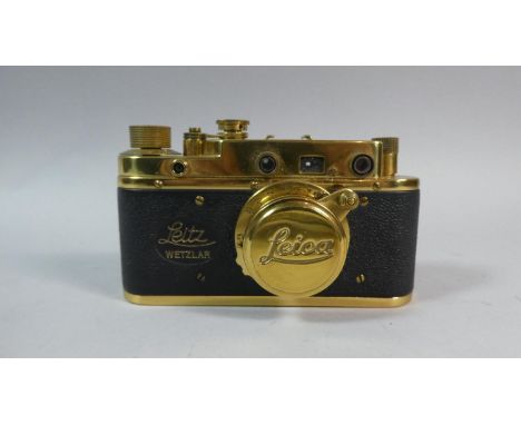A Contemporary Brass Mounted Camera in the Leica style but formed from a FED 3 Camera body. (Not Leica)