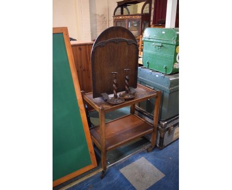 An Edwardian Two Tier Oak Trolley Oak Fire Screen and Pair of Barley Twist Candle Sticks 