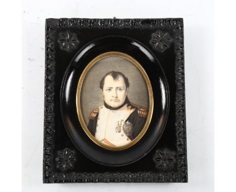 A hand coloured miniature portrait print of Napoleon Bonaparte, in relief moulded ebonised frame, overall 15cm x 13cm 