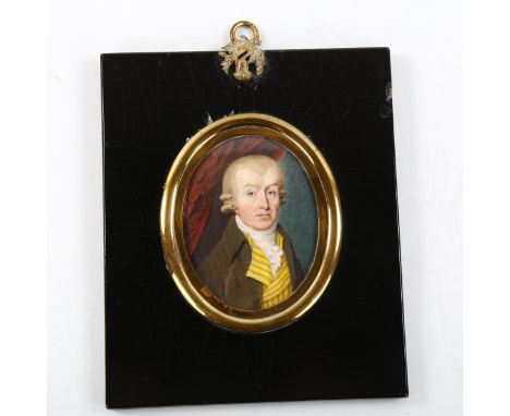 Early 19th century miniature painted portrait on ivory, of a gentleman in a yellow waistcoat, unsigned, inscribed verso Rev. 