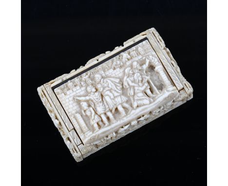 An 18th century snuff box, composed with earlier ivory plaques, including a relief carved depiction of the Siege of Troy and 