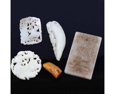 A Chinese Shoushan artist's seal, a carved jade tablet with calligraphy, a carved jade roundel and jade fruit (5) 