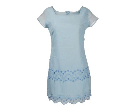 A dress as seen worn by Emily Bergl as "Rachel Lang" in the thriller The Rage: Carrie 2 (United Artists, 1999).The light blue