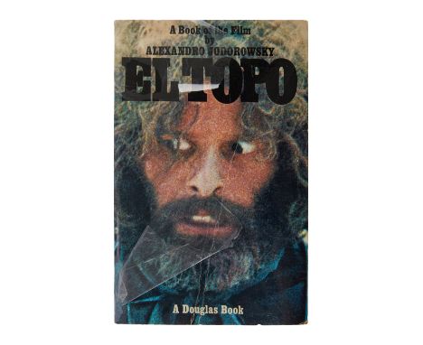A paperback copy of El Topo (Douglas Book Corporation, 1971) that personally belonged to Dennis Hopper. The cover reads "A Bo