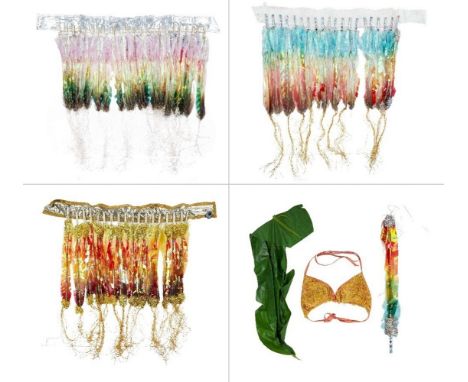 Three shiny, iridescent faux-feather costume components, two extra costume pieces, and a bra from the production of Mike Nich