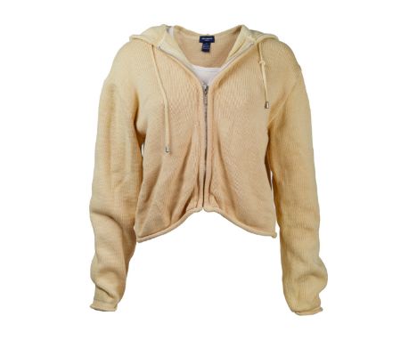 A sweater jacket and tank top as seen worn by Emily Bergl as "Rachel Lang" in the thriller The Rage: Carrie 2 (United Artists