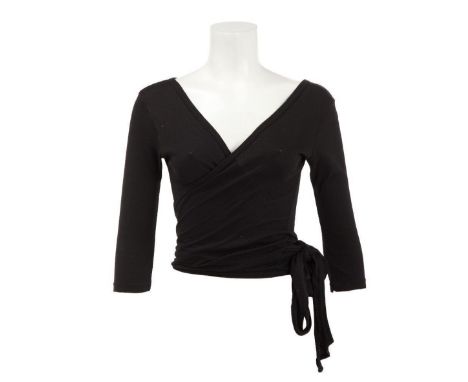 A pair of tops for Meryl Streep as "Susan Orlean" in the comedy/drama Adaptation (Columbia Pictures, 2003). Together with a p