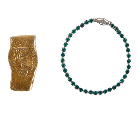 Two original rhinestone bracelet and ingot metal props from One-Eyed Willy's treasure in Richard Donner's The Goonies (Warner