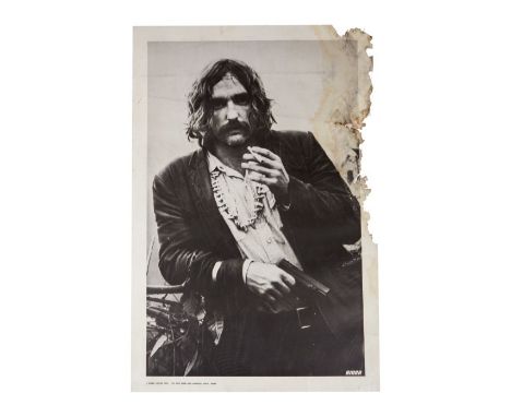 A 1970 Dennis Hopper personality poster from the Mabel Dodge Luhan house in Taos, New Mexico. The poster can be seen affixed 