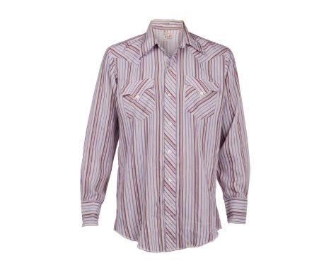 A vintage striped button-down shirt, personally-owned by Dennis Hopper.The cotton-blend, western-style button-down features a