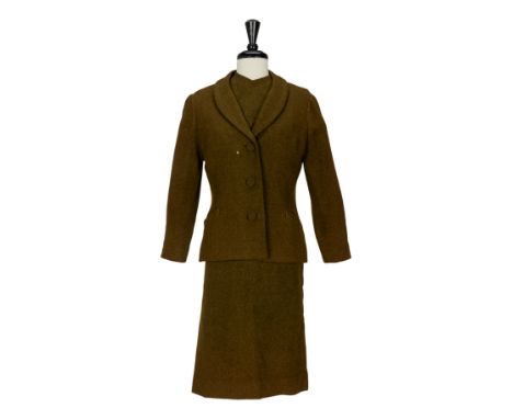 A dark green wool suit jacket and matching skirt as seen worn by Bette Davis in the film Where Love Has Gone co-starring Susa