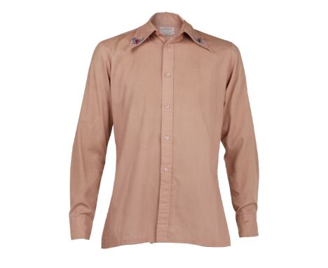 A pair of vintage embroidered shirts, personally owned by Dennis Hopper.This lot includes a dusty rose, cotton-blend button-d