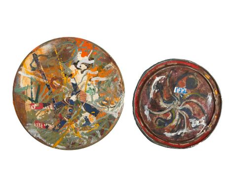 A pair of painted metal lid collages, believed to have been created by Dennis Hopper.Though better known for his photography 