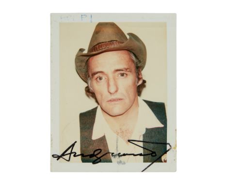 A Polaroid photograph of Dennis Hopper wearing a white shirt, brown vest, and a cowboy hat that was taken by Andy Warhol and 