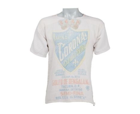 A group of four vintage tunics, personally-owned by Dennis Hopper. The group includes three short-sleeved feedsack tunics, wi