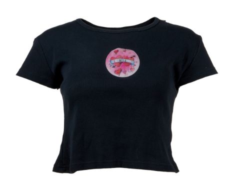 A t-shirt for Missi Pyle as a Cafe 24 waitress in As Good as It Gets (TriStar Pictures, 1997).The black cropped t-shirt featu