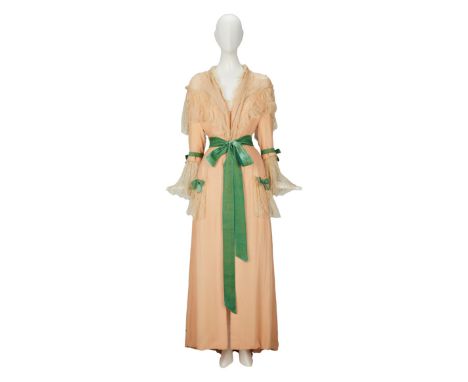 A late-19th-century style full-length peach silk-chiffon robe as seen worn by Ingrid Bergman as "Clio Dulaine" in the period 