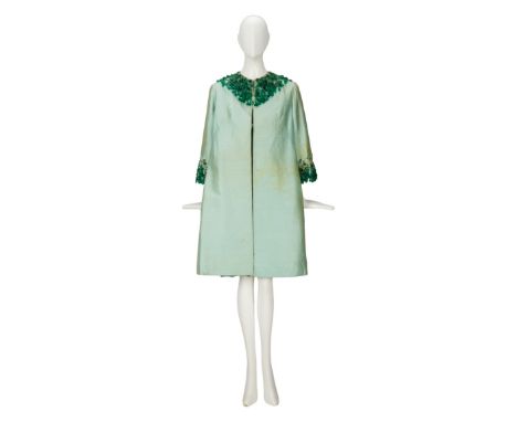 A pale green baby doll dress with a jeweled neck, together with the matching overcoat, custom-made for Diana Dors by Darnell 