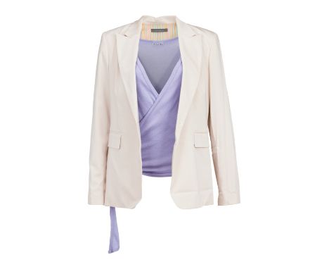 An ensemble as seen worn by Meryl Streep as "Susan Orlean" in the comedy/drama Adaptation (Columbia Pictures, 2003).The ensem