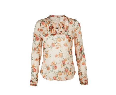 A group of three tops for Paz Vega as "Flor" in the romantic comedy Spanglish (Columbia Pictures, 2004).The group includes a 