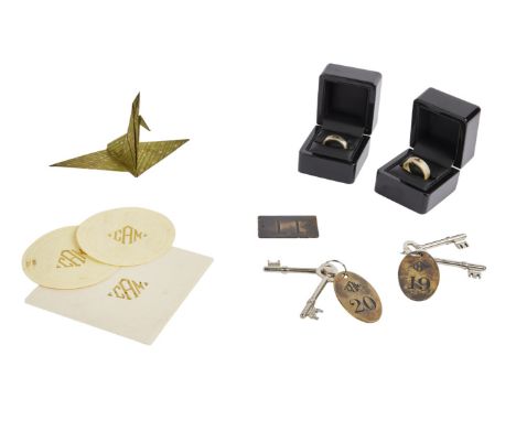 A collection of assorted props as seen inthe James Bond film Spectre (MGM, 2012).This collection includes a CAM napkin and tw